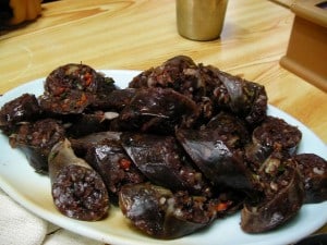 Sundae (순대) – Boiled Intestine Sausage on a white plate