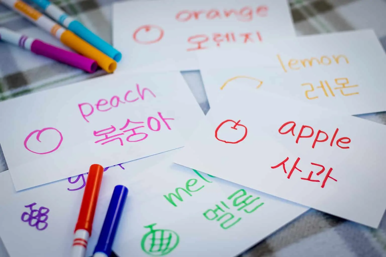 Korean fruits written on index cards in different colors to help learn Korean