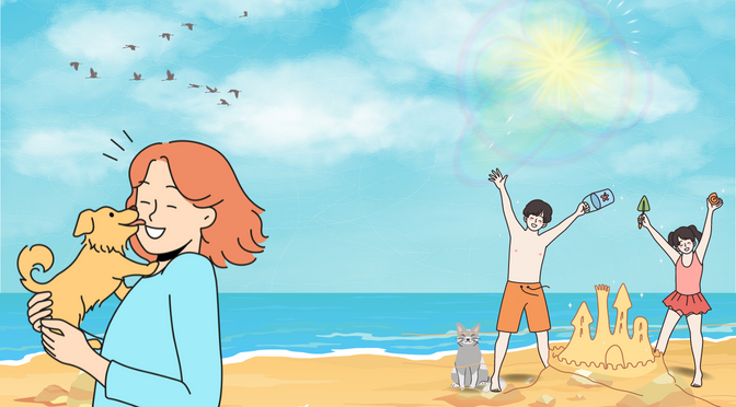 A girl carrying a puppy at the beach, a boy and a girl making a sand castle at the back with a cat
