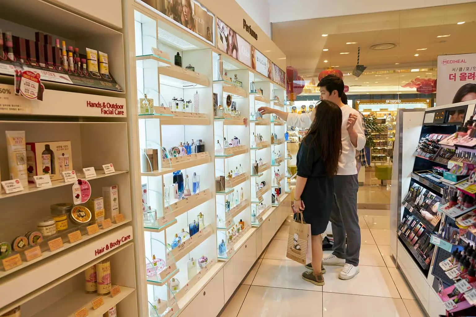 People shopping for makeup and cosmetics in Korea