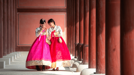 Two women wearing hanbok