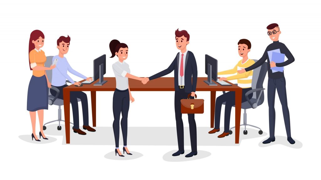 Successful Business Meeting showing a man and a woman shaking hands with officemates around them